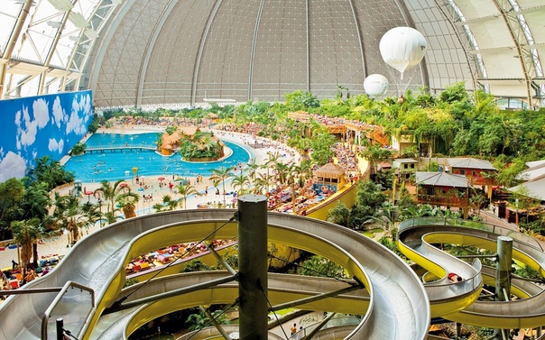 Аквапарк в Берлине Tropical Islands крупнейший крытый аквапарк в мире Тропический остров (Das Tropical Islands Resort), который находится на северо-востоке Германии, вблизи городка Краусник,